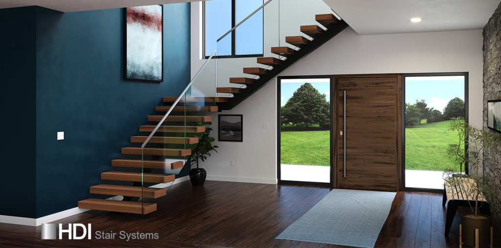 HDI Stair Systems services image showing residential staircase over an entry way looking out on a manicured lawn.