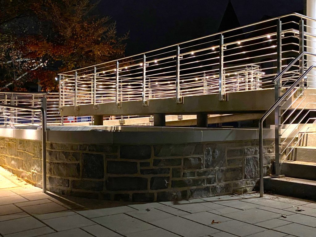 LED railings lighting up the exterior stairs.
